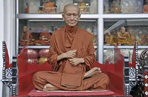Deceptively lifelike monk figure