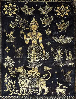 Decorated outer wall of the Sim prayer hall with gilded images of Apsaras