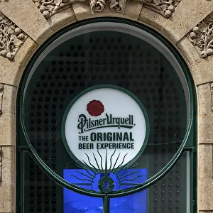 Decorated window with Pilsner Urquell logo