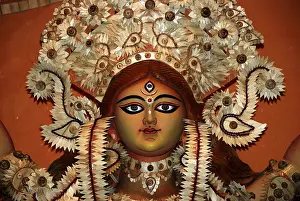 Category Historic EN Prints: Decorative Durga clay model showing third eye open on Durga puja