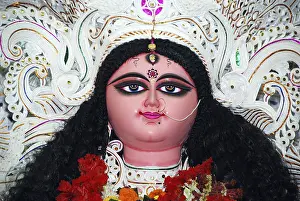 Category Historic EN Prints: Decorative Durga clay model showing third eye open on Durga puja