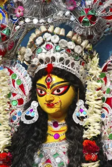Category Historic EN Prints: Decorative Durga clay model showing third eye open on Durga puja