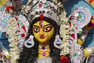 Category Historic EN Prints: Decorative Durga clay model showing third eye open on Durga puja
