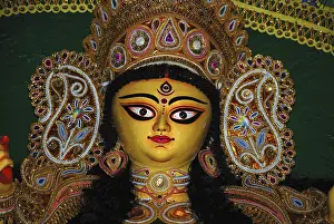 Category Historic EN Prints: Decorative Durga clay model showing third eye open on Durga puja