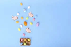 Decorative multicolored eggs and pink gingerbread in the form of rabbit