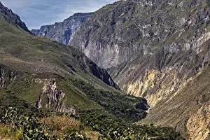 Framed Print : Deep gorge with dramatic cliffs and sparse vegetation Framed Print : Deep gorge with dramatic cliffs and sparse vegetation