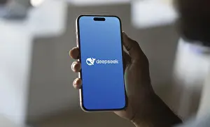 Category Historic EN Prints: Deepseek Ai logo is displayed on smartphone