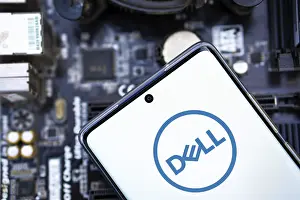 Category Historic EN Prints: Dell company logo displayed on mobile phone
