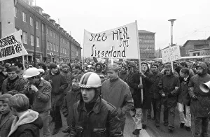 Several hundred demonstrators, among them many young people