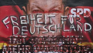 Denigration of a large poster for the 2025 federal election by the SPD with Olaf Scholz
