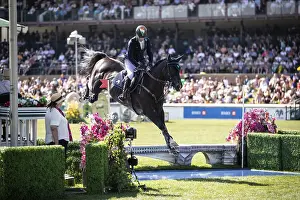 Category Historic EN Prints: Denis Lynch of Ireland and riding Vistogrand compete in the first round of the 1