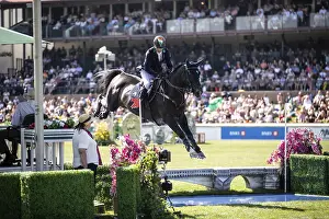 Category Historic EN Prints: Denis Lynch of Ireland and riding Vistogrand compete in the first round of the 1