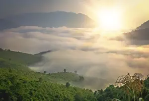 Dense clouds at the bottom of the valley in mountains of northern Laos