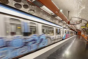 Departing train in a metro station