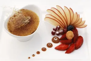 Dessert, tonka bean creme brylee decorated with fruit