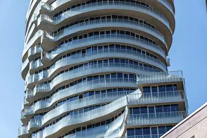 Framed Print : Detailed view of the curved balcony facade of a modern high-rise building