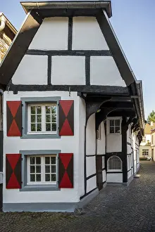 Category Cities DE Prints: Detailed view of a half-timbered house with striking