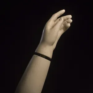 A detailed view of a mannequin hand with fingers slightly curled