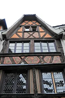 Detailed view of an old half-timbered house with wood carving