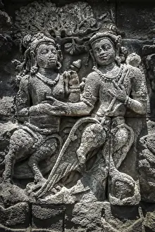 Details of sculptures and reliefs on the walls of the Borobudur temple in Java