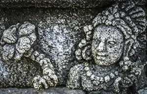Details of sculptures and reliefs on the walls of the Borobudur temple in Java