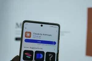 Dhaka, Bangladesh 05 Feb 2025 : Claude logo on smartphone screen with its website in background