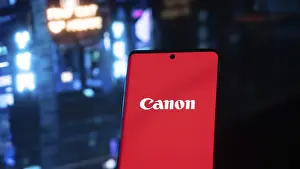 Dhaka, Bangladesh 16 May 2025: Canon Iphone Screen with Colored Pencils and Notebook