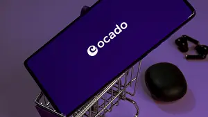 Dhaka, Bangladesh 19 April 2025: Ocado Mobile Website with laptop website in the background