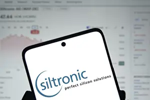 Category Historic EN Prints: Dhaka, Bangladesh- Siltronic AG logo is displayed on smartphone