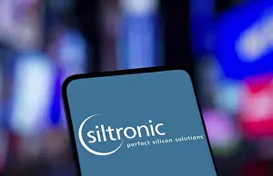 Category Historic EN Prints: Dhaka, Bangladesh- Siltronic AG logo is displayed on smartphone