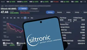 Category Historic EN Prints: Dhaka, Bangladesh- Siltronic AG logo is displayed on smartphone