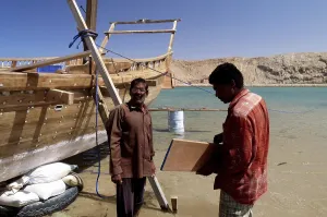 Dhow under construction, shipyard in Sur