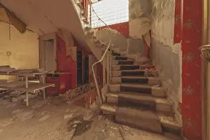 Dilapidated building with a staircase