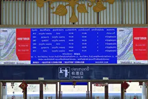 Category Historic EN Prints: Display board on Laotian table in the waiting hall of the modern railway station of Luang Prabang of the Laos-China