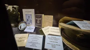 Display case with historical documents and memorabilia