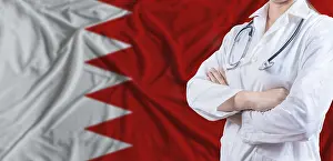 Doctor with crossed arms on Bahrain flag