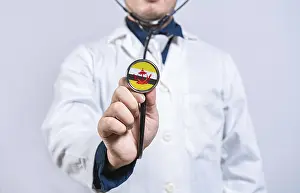Doctor hands holding stethoscope with Brunei flag