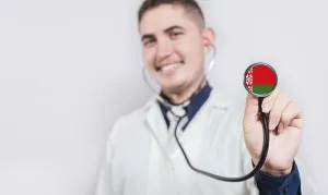 Doctor showing stethoscope with Belarus flag