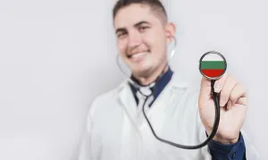 Doctor showing stethoscope with Bulgaria flag