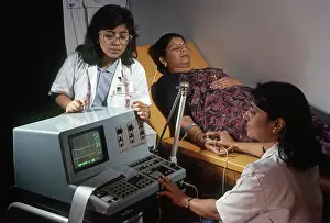 Doctors checking blood pressure of Patient