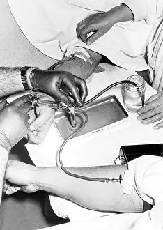 Doctor's visit, 1950s, exact place unknown
