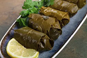 Dolma, minced meat with rice, in grape leaves