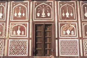 Door west gate made by red sand stone and inlay work in Itimad-ud-Daula tomb