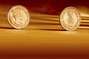 Double pair Indian currency five rupees coin front side and backside manner embossed Jawaharlal Nehru centenary 1989 on orange background