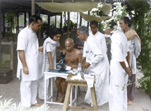 Dr Gajjar showing Mahatma Gandhi hookworm ova under microscope, Mumbai, India, Asia, May 1944, Asia