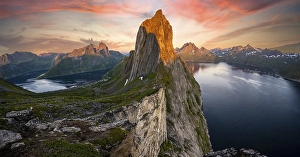Dramatic clouds, evening mood, steep mountain Segla