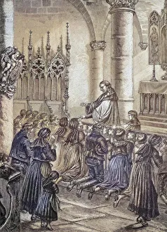 Drawing the ash cross on the forehead of the faithful