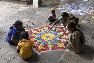 Category Buddhism Prints: Drawing kolam, rangoli inside the temple floor