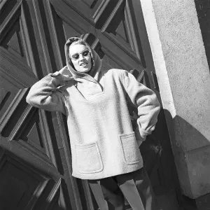 Dressed for autumn and winter in the 1940s A young woman is wearing a anorak and ski pants