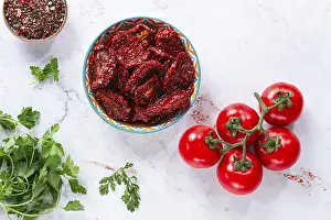 Dried tomatoes, in a ceramic bowl